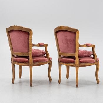 A pair of rococo style armchairs, 20th Century.