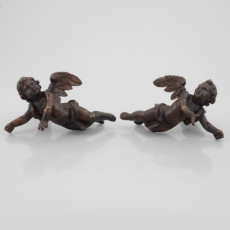 Two Baroque style carved wood putti, 19th/20th Century.