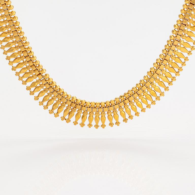 Halsband, armband och örhängen, 14-21K guld.