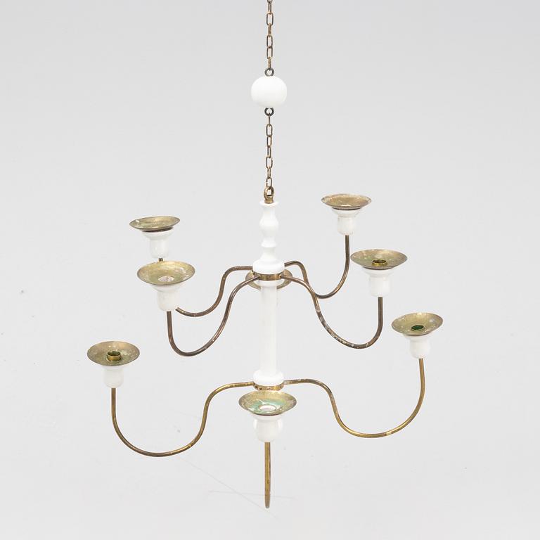 Josef Frank, a model '2586' wodden and brass chandelier, Firma Svenskt Tenn.