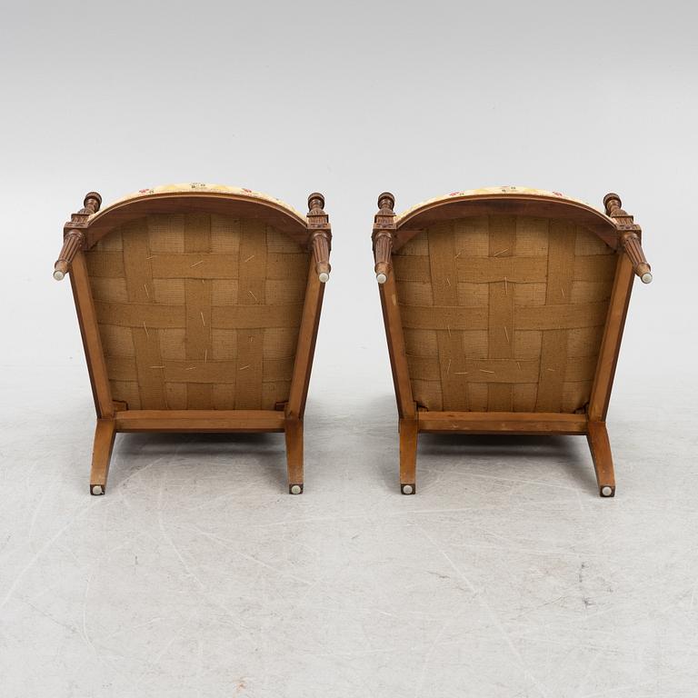 A pair of Directoire-style armchairs, 20th century.