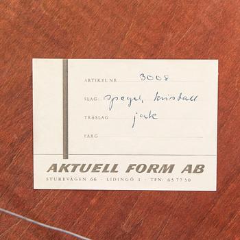 A Sigvard Bernadotte jacaranda mirror for Aktuell Form later part of the 20th century.