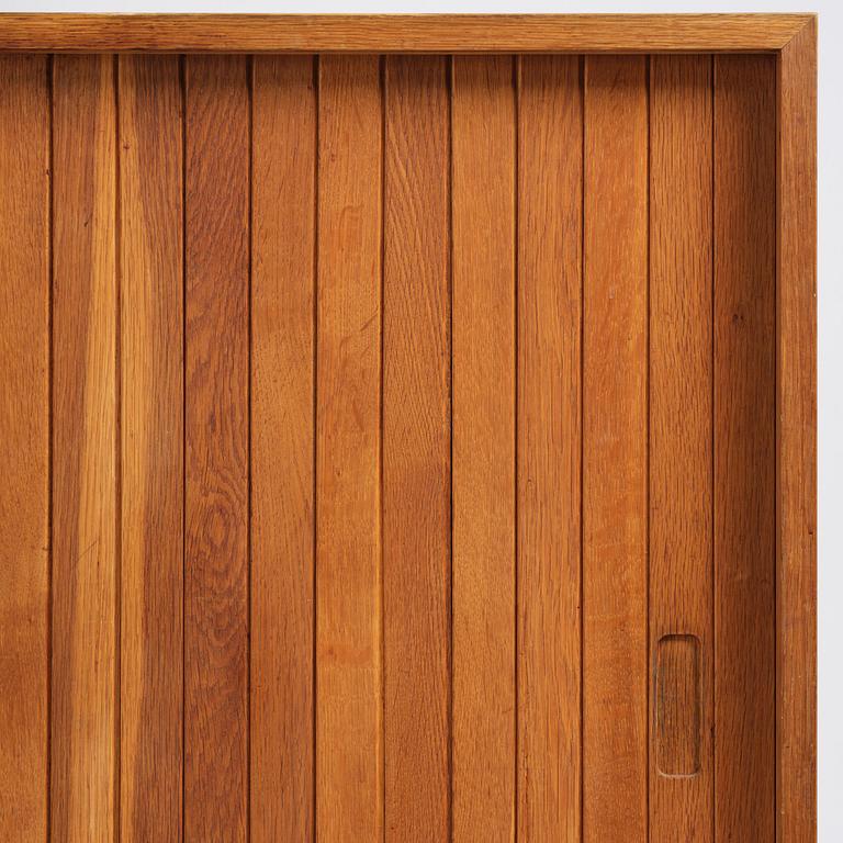 Jørgen Høj, an oak cabinet, Knud Willadsen Møbelsnedkeri, Lillerød, Denmark, 1950s.