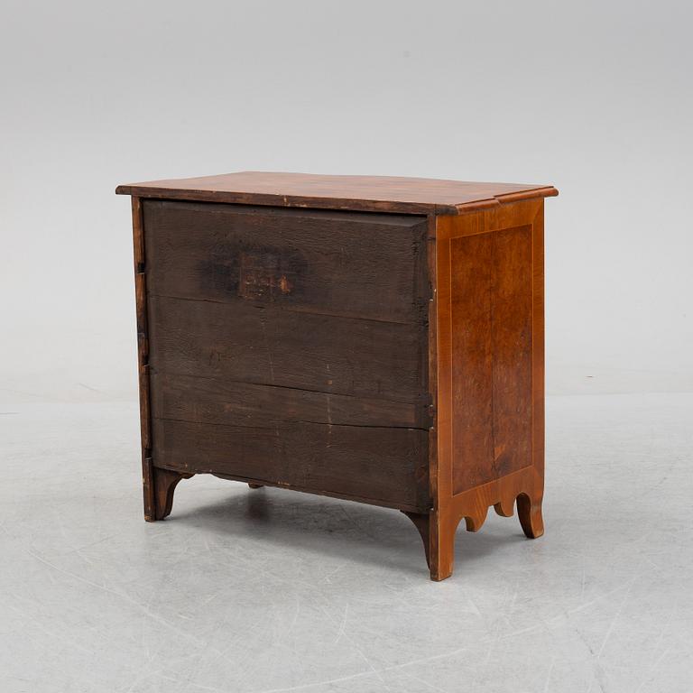 A Northern-European late baroque chest of drawers, mid 18th century.