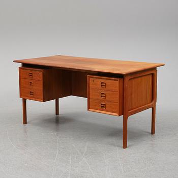 ARNE VODDER, a 1960's teak desk.