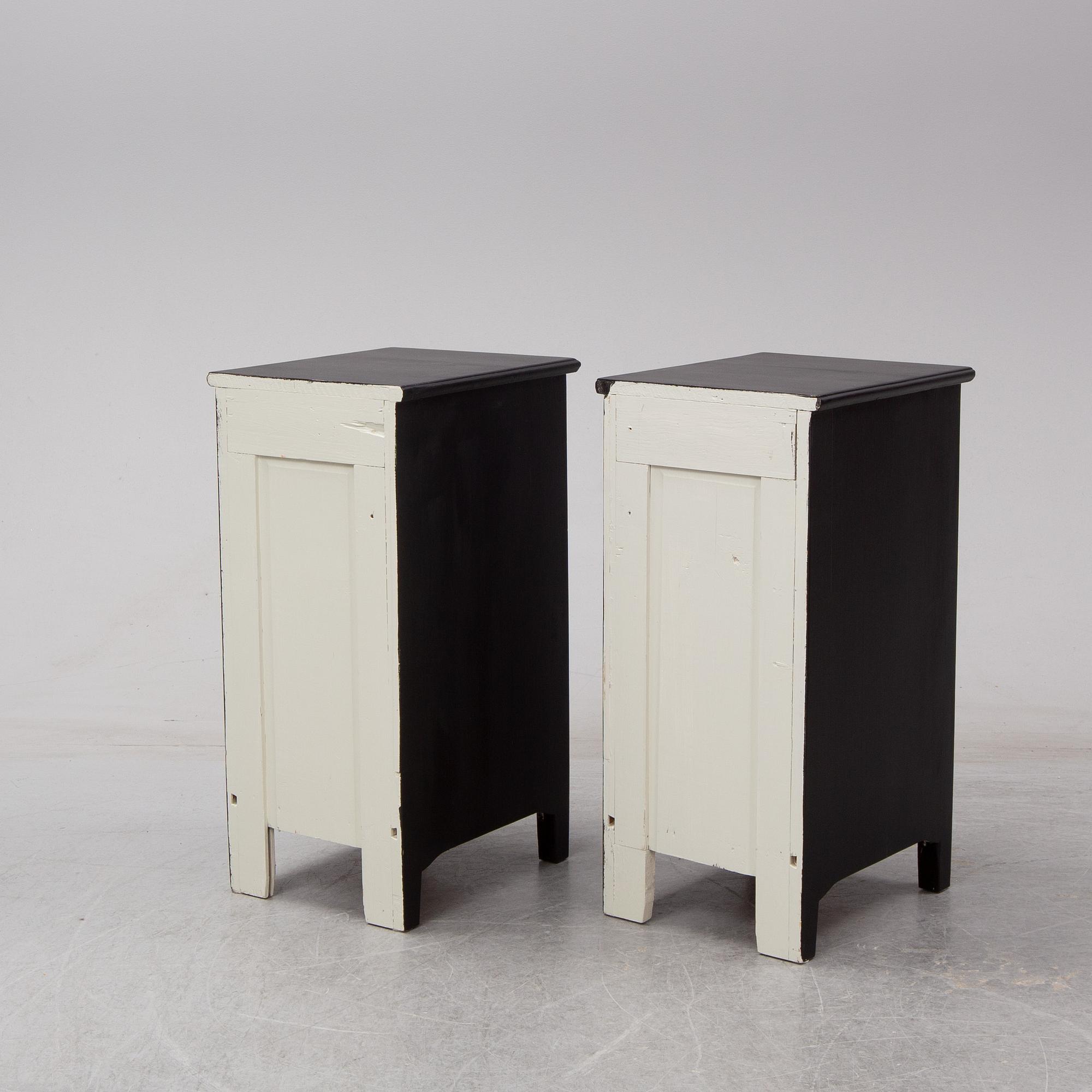 A pair of early 20th century bedside tables / cupboards.