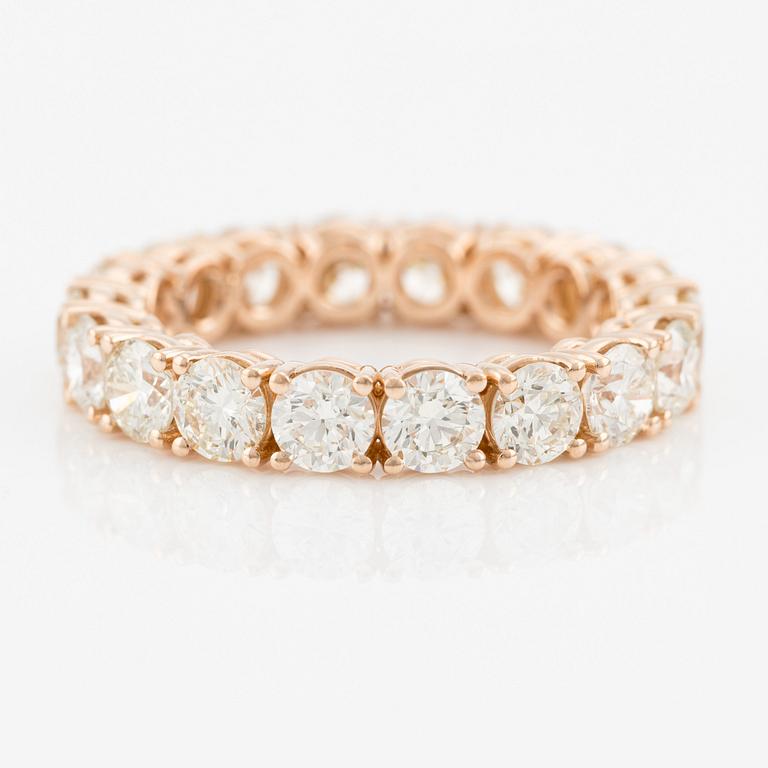 Eternity ring with brilliant-cut diamonds.