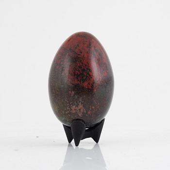 A faience sculpture of an egg by Hans Hedberg Biot, France.