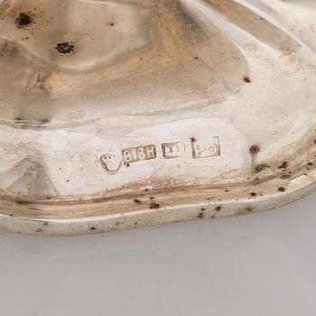 A silver coffee pot, sugar bowl, cream jug, and sugar tongs, Finland 1926-49.