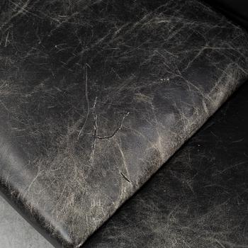 A 1960's leather covered sofa.