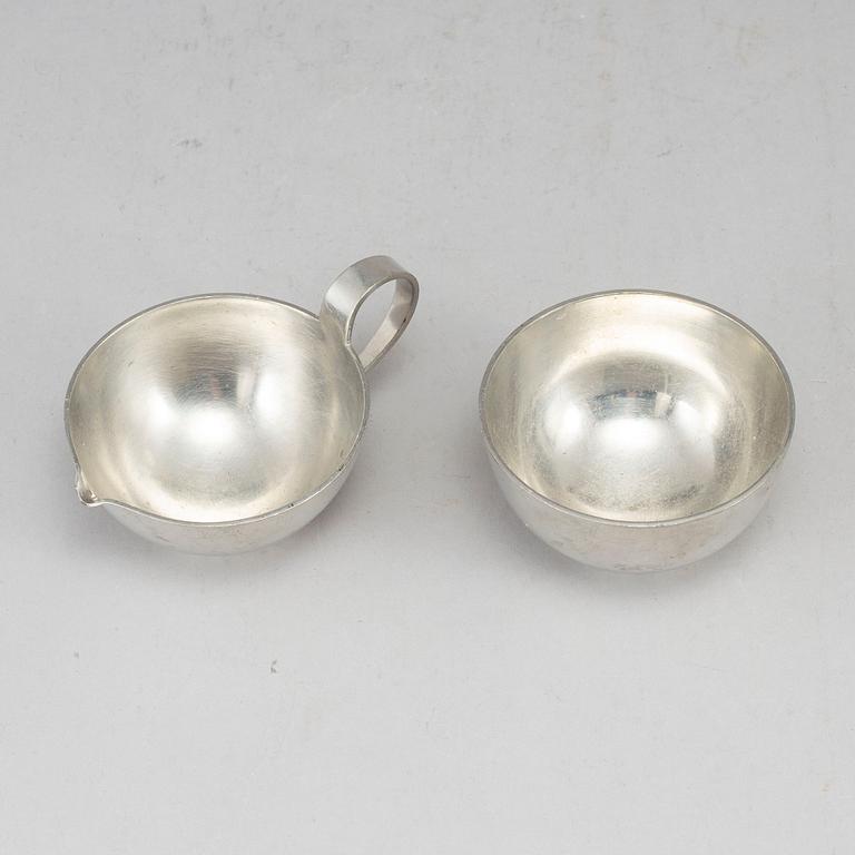 FIRMA SVENSKT TENN, a pewter sugar bowl and creamer. Stockholm 1957.
