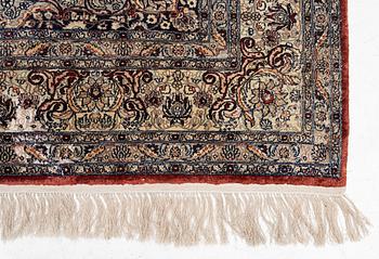 Carpet, part silk, approx. 240 x 158 cm.