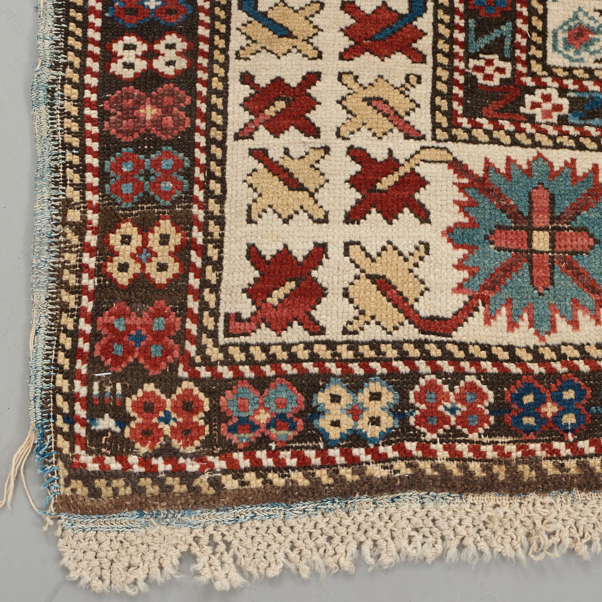 MATTO, an antique Kuba, ca 289,5 x 97 cm (as well as the ends with 1 cm light blue soumak).