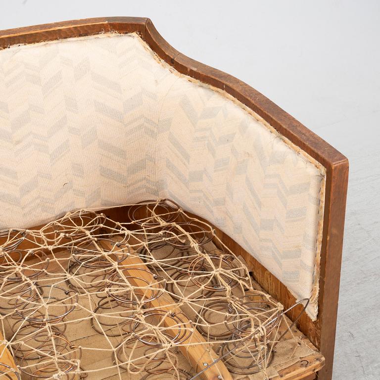 Otto Wretling, attributed to, an Art Nouveau pine sofa, Sweden early 20thC.