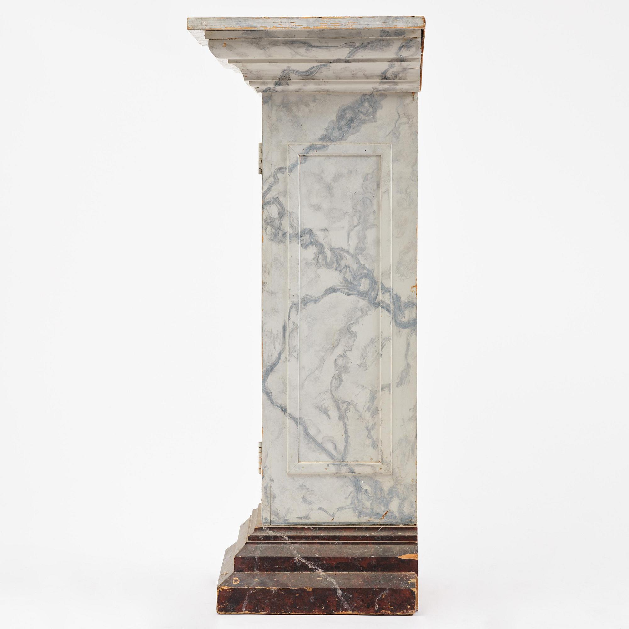 A Swedish column-shaped cabinet late 19 th century.