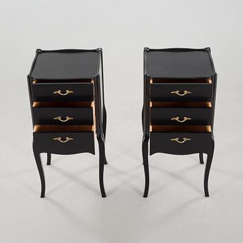 A pair of rococo style bedside tables from the second half of the 20th century.