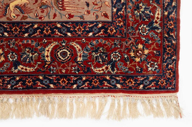 A semi-antique pictorial Isfahan rug signed (Sadegh) Seirafian, c. 170 x 116 cm.