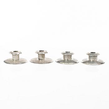 Two pairs of Persian silver candle holders, 20th century.