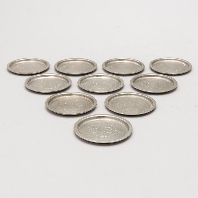 ten pewter coasters, marked Svenskt tenn, 1920/30s.