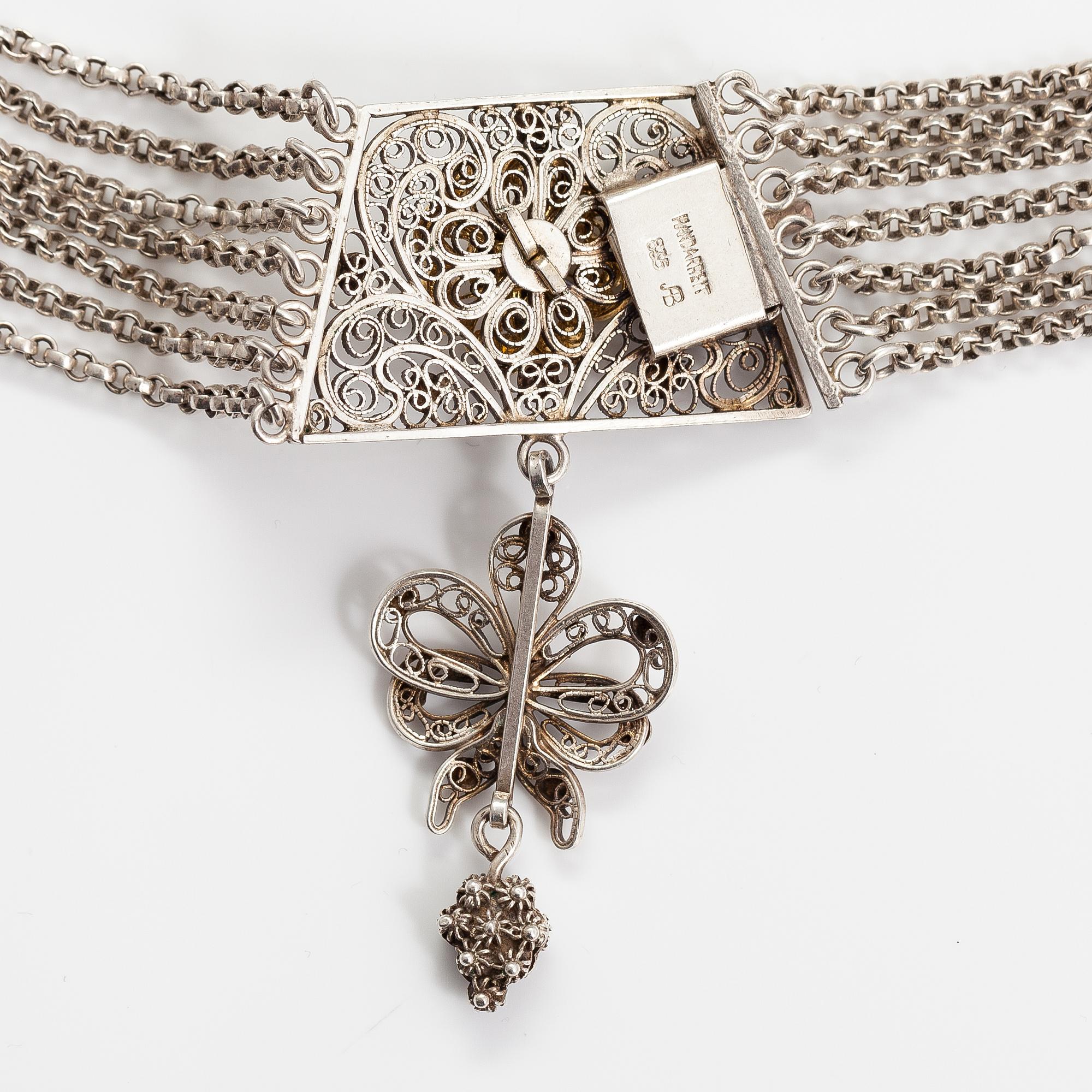 A silver necklace.