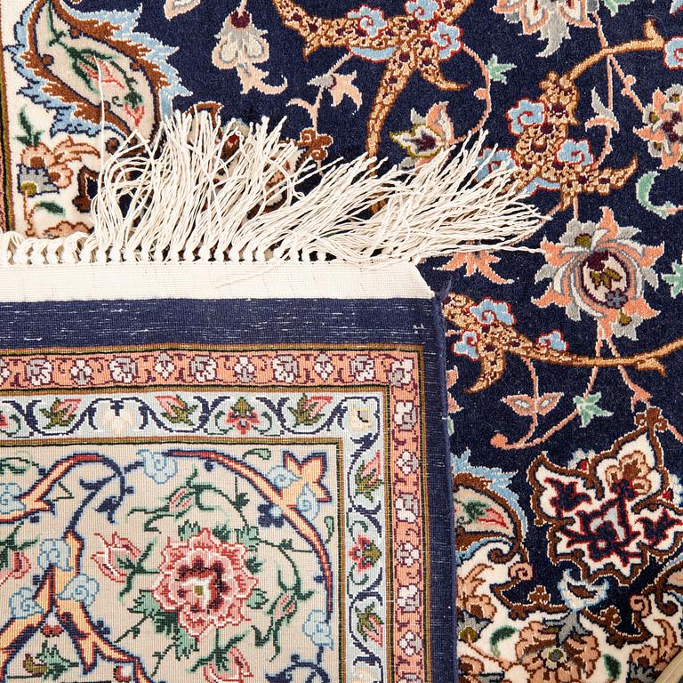 An old isfahan carpet signed part silk approx 223x146 cm.