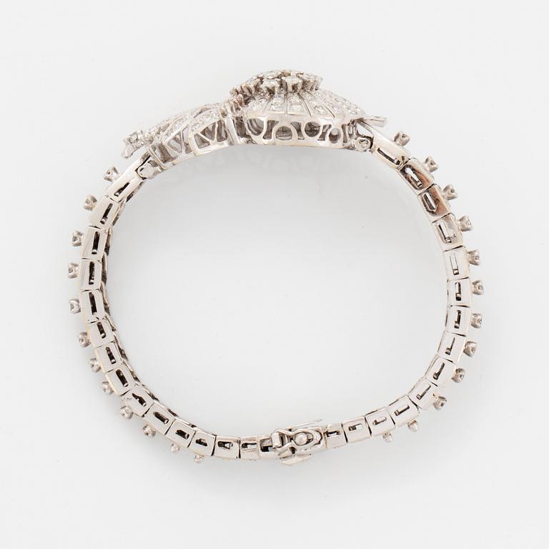 White gold and brilliant-cut diamond bracelet.
