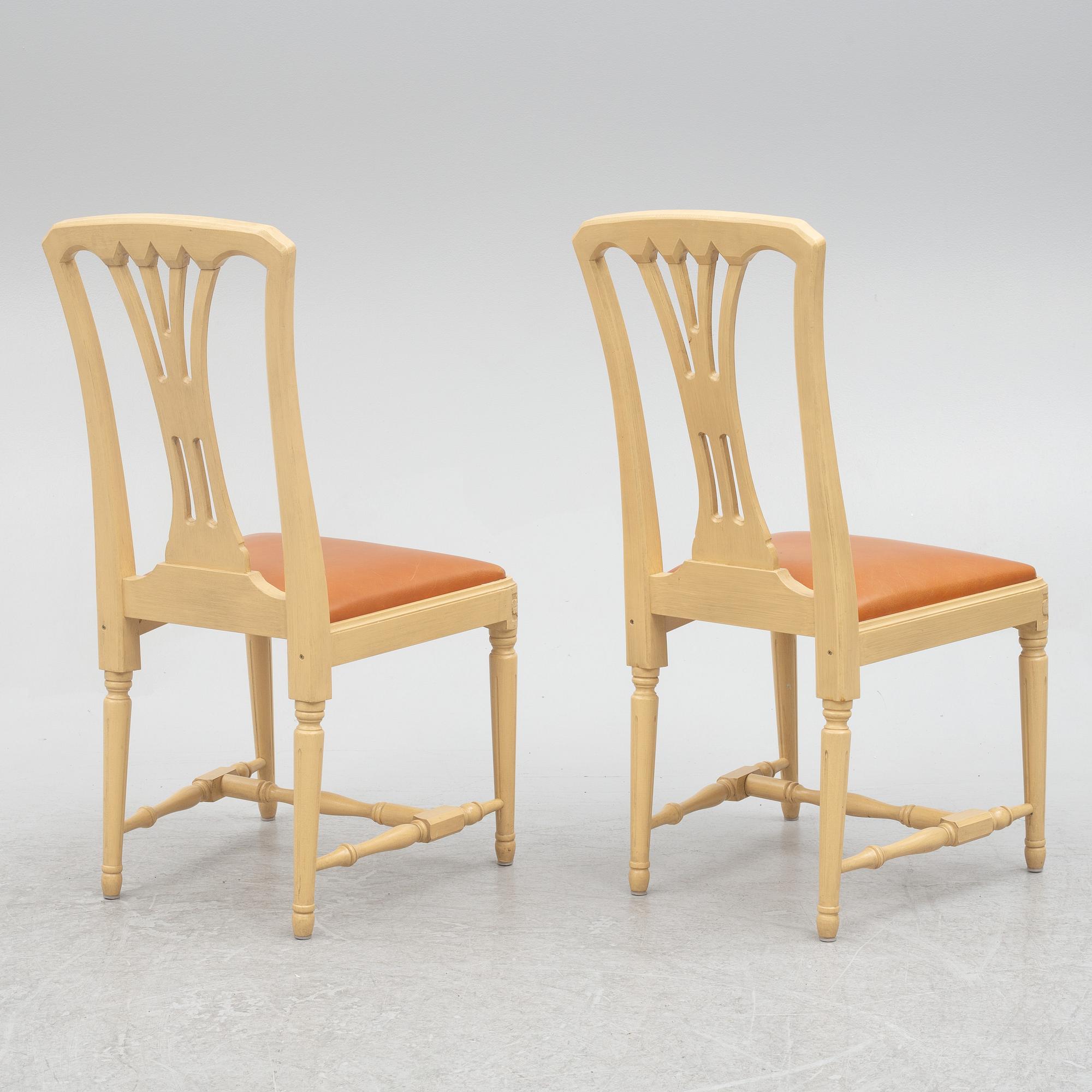 A Gustavian style dining table with six dining chairs, Sweden, 21st century.