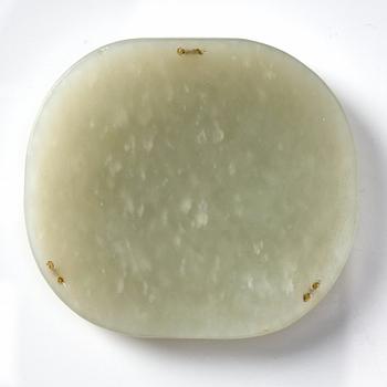 A nephrite placque decorated with peaches and a bat, late Qing dynasty.