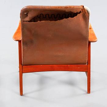 An armchair named "Contour 13", designed by Alf Svensson for Dux, made by Ljungs Industrier AB in Malmö.