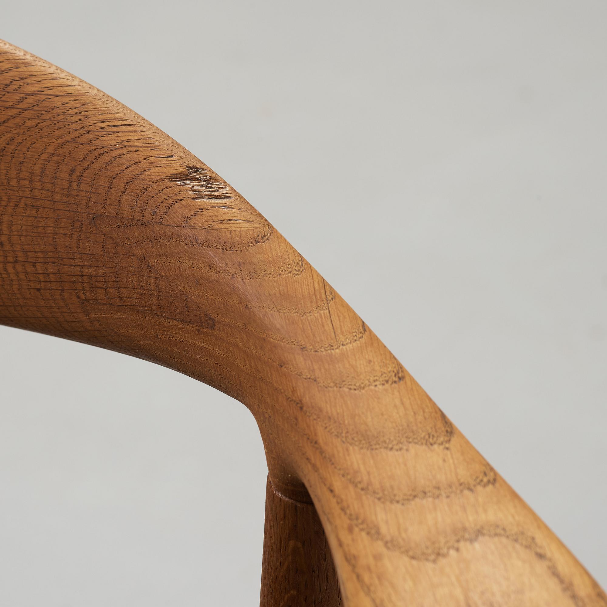 A set of six Hans J Wegner oak 'The Chair', Johannes Hansen, Denmark.