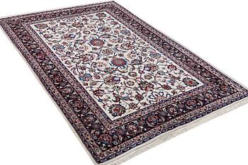 An oriental carpet, part silk, c. 294 x 201 cm.