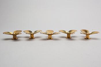 PIERRE FORSSELL, 5 brass candlesticks, Skultuna, 1970-/1980's.