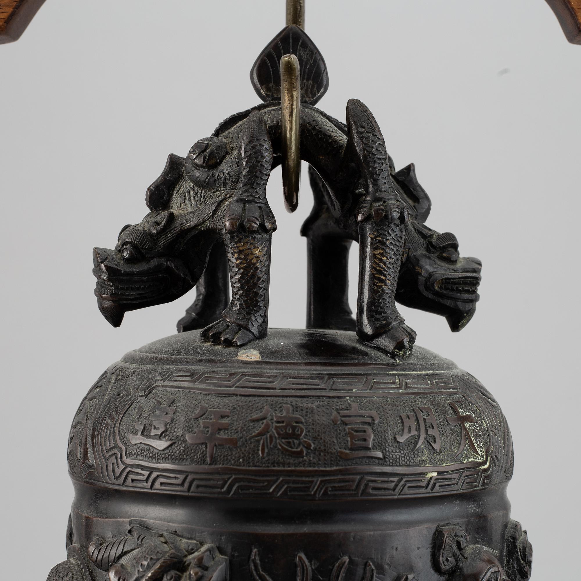 A Chinese bronze bell, early 20th Century.