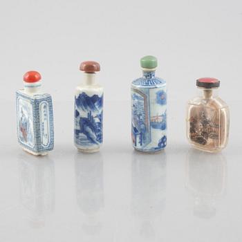A group of nine Chinese glass and porcelain snuffbottles, 20th century.