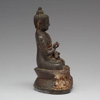 A bronze figure of Buddha, Ming dynasty (1368-1644).