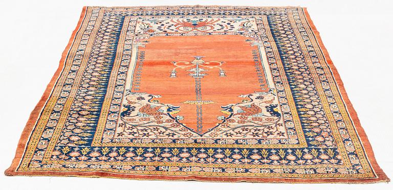 A rug, antique, silk Heriz, ca 166,5-170 cm x 116-120 cm.