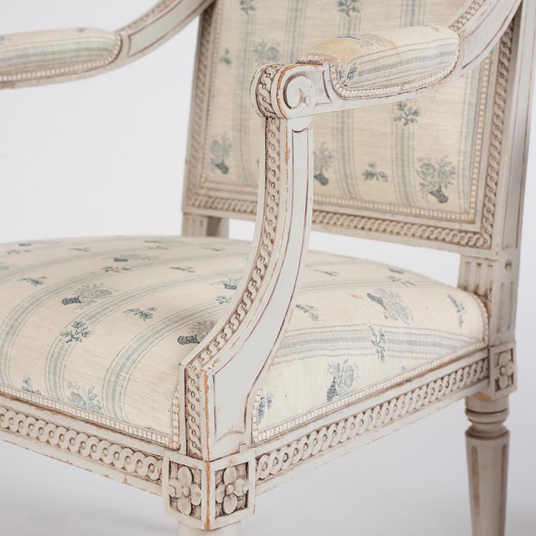 A pair of Gustavian open armchairs by J. Lindgren (master in Stockholm 1770-1800).