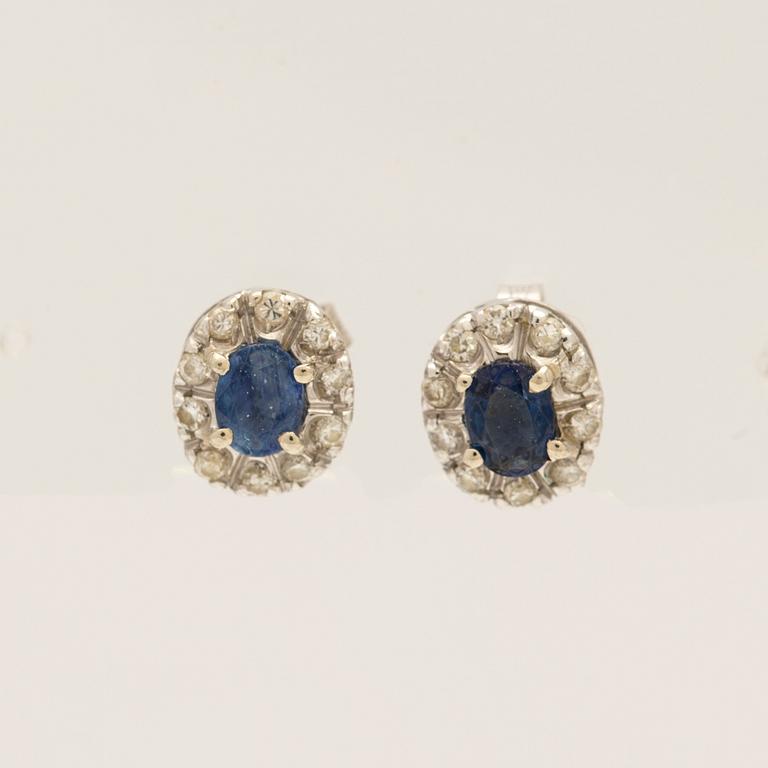 Earrings, a pair, 18k white gold with brilliant-cut diamonds and sapphire.