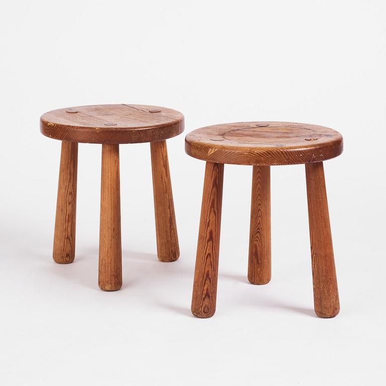 Axel Einar Hjorth, a pair of "Skoga" stained pine stools, Nordiska Kompaniet 1930s.
