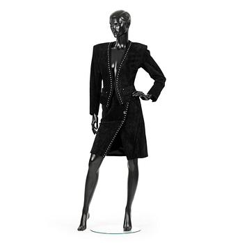 YVES SAINT LAURENT, a two-piece suit consisting of jacket and skirt.