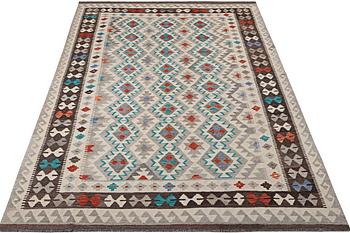 A Kilim carpet, c. 295 x 192 cm.