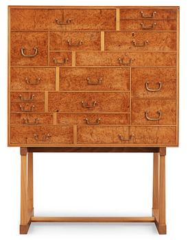 A Josef Frank burrwood, mahogany and walnut cabinet, Svenskt Tenn, model 881.