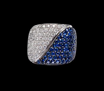 1109. A blue sapphire and diamond ring, tot. 1.26 cts.