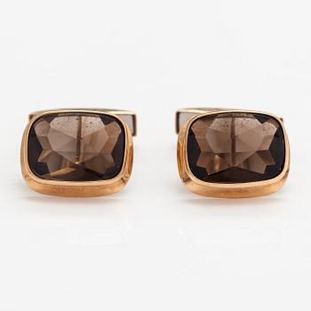 A pair of 14K gold cufflinks with smoaky quartzes. Liitola & Koistinen kultasepät, Turku 1977.