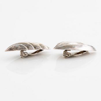 Earrings, silver, in the form of stylised leaves.