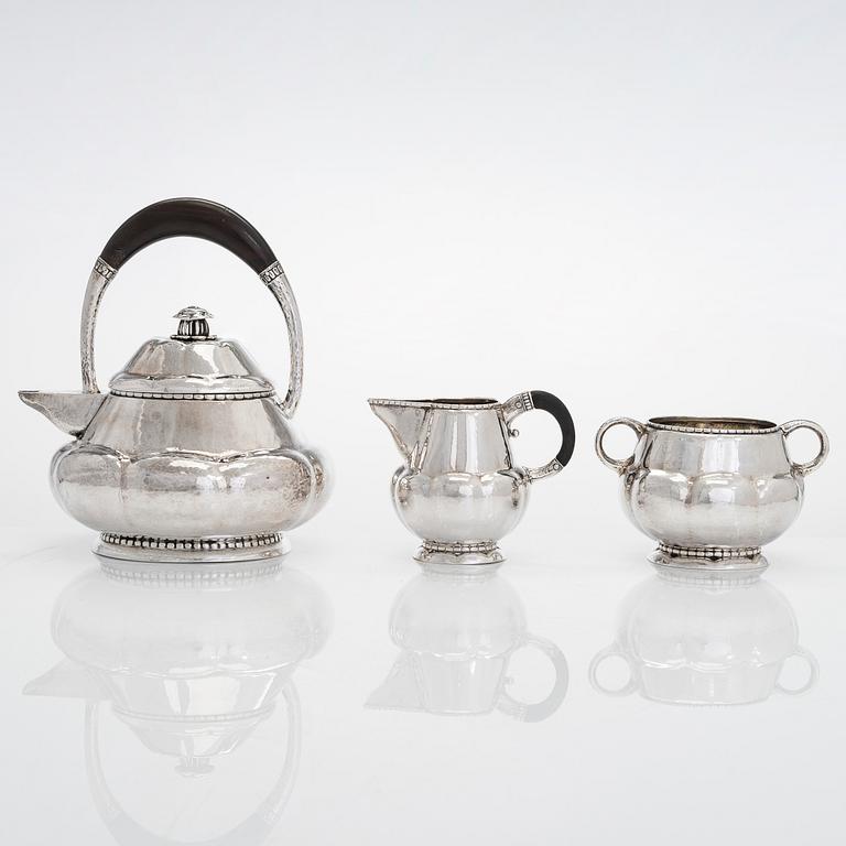 Albert Feinauer, a six-piece silver coffee and tea service with tray, Weimar-Schmuck, Germany 1921-1925.