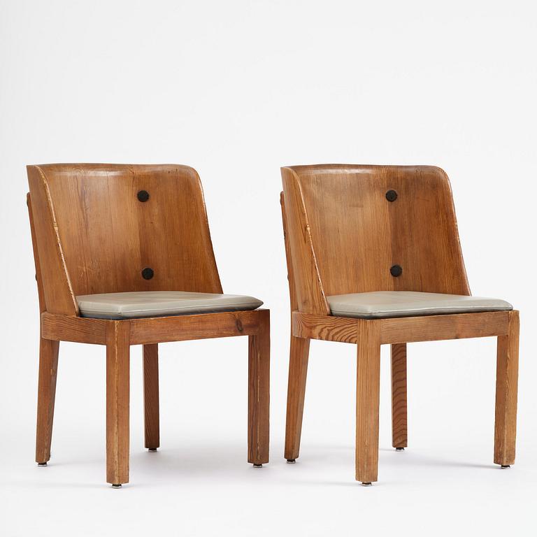 Axel Einar Hjorth, a pair of stained pine "Lovö" armchairs, Nordiska Kompaniet, Sweden, 1930s.