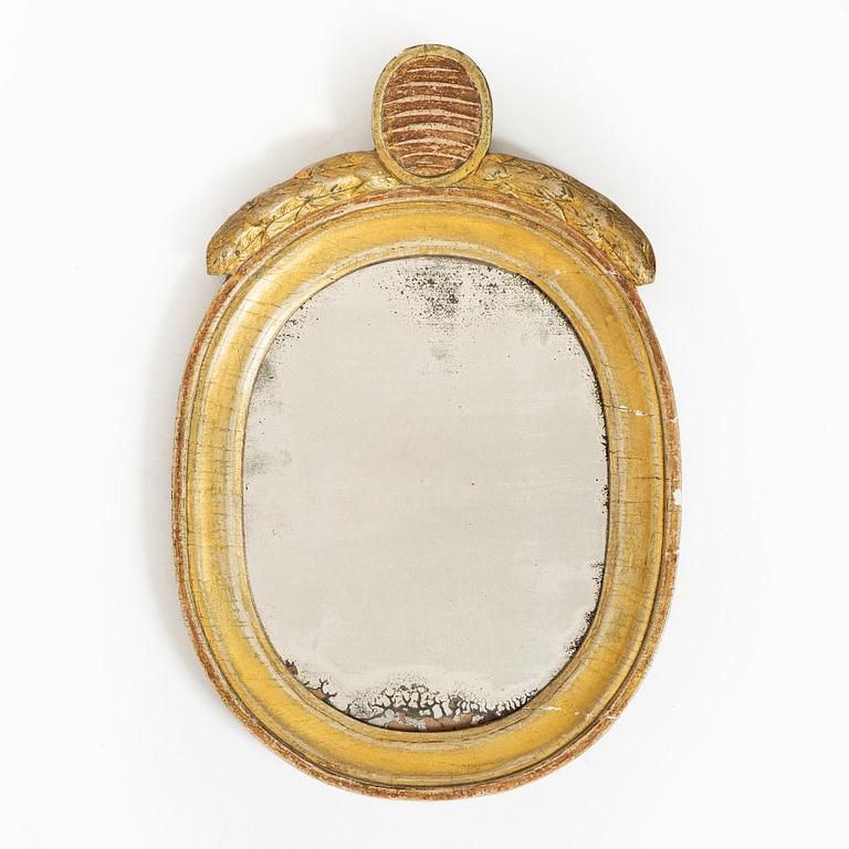 A Gustavian mirror, late 18th century.