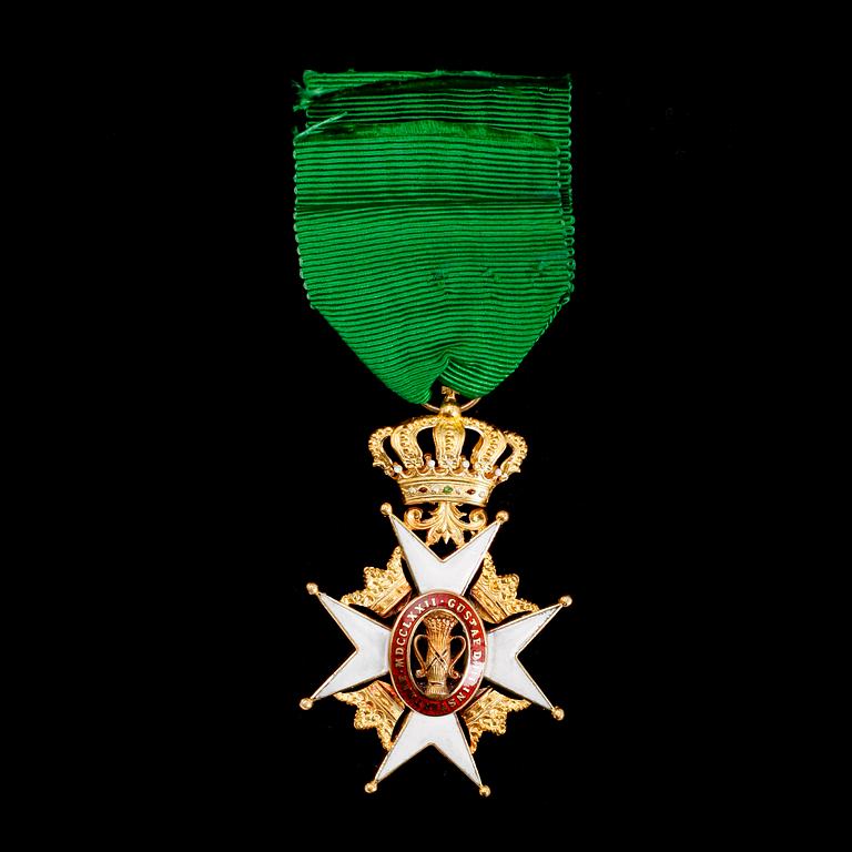 MEDALJ, 18 k guld, Vasaorden. Vikt ca 18 gram.