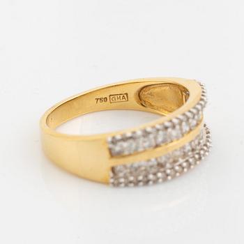 18K gold and small brilliant cut diamond ring.